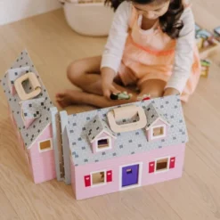Melissa & Doug Fold And Go Wooden Dollhouse With 2 Dolls And Wooden Furniture -Melissa & Doug Shop GUEST 17ff55ba 78ba 4cf4 b35c d6d6ad047c2e