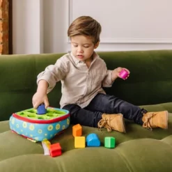 Melissa & Doug K's Kids Take-Along Shape Sorter Baby Toy With 2-Sided Activity Bag And 9 Textured Shape Blocks -Melissa & Doug Shop GUEST 6891f41c 9742 4618 aea5 41d97a455e95