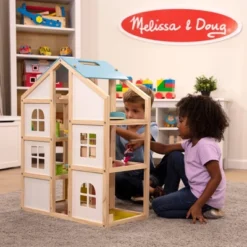 Melissa & Doug Hi-Rise Wooden Dollhouse With Furniture, Garage And Working Elevator -Melissa & Doug Shop GUEST db599fb6 76ac 4af8 b5d9 318c79c31cc6